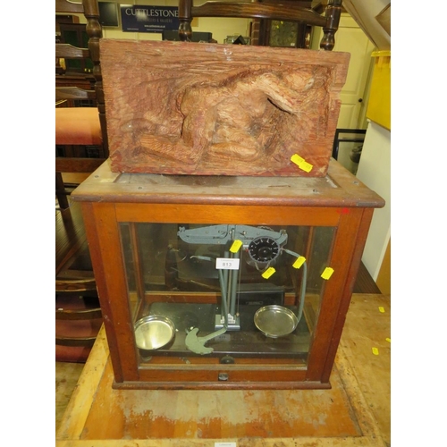 813 - A CASED SET OF CHEMISTS SCALES WITH AN UNUSUAL CARVED FIGURATIVE BLOCK (2)