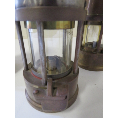 266 - THREE ASSORTED MINERS LANTERNS