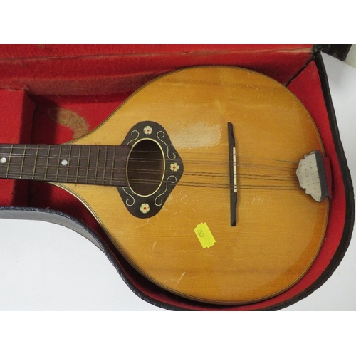 280 - A CASED 8 STRING MANDOLIN STYLE INSTRUMENT