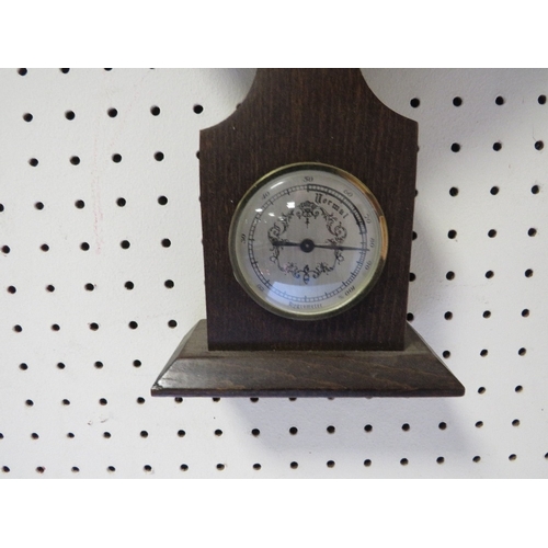 281 - A MODERN COMBINATION BAROMETER/CLOCK THERMOMETER