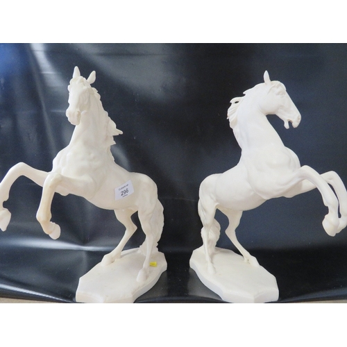 296 - TWO RESIN TYPE MODELS OF HORSES