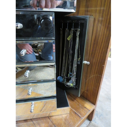 305 - A MIRRORED DRESSING TABLE JEWELLERY BOX, CHEST OF DRAWERS WITH CONTENTS