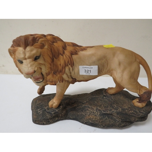 321 - A BESWICK LION ON A ROCK