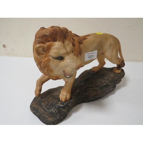 321 - A BESWICK LION ON A ROCK