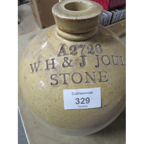 329 - AN ADVERTISING STONEWARE FLAGON FOR W H & J JOULE STONE