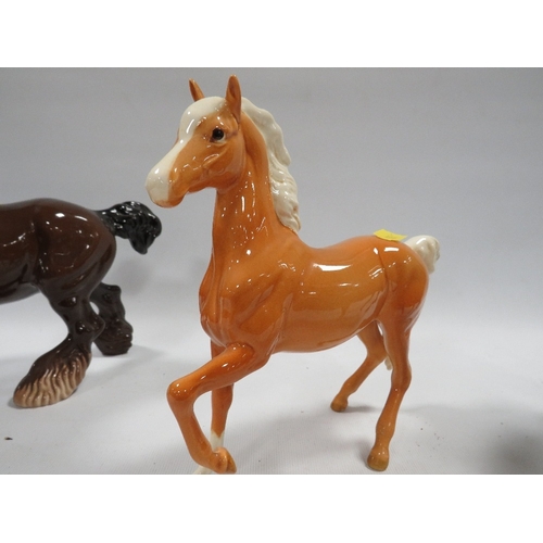 336 - THREE BAY BESWICK HORSES TO INCLUDE A CANTERING SHIRE