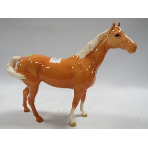 337 - TWO BESWICK PALOMINO HORSES ONE A/F