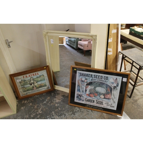 47 - A LARGE CREAM MIRROR TOGETHER WITH TWO FRAMED ADVERTISING PRINTS (3)