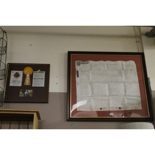 51 - A LARGE FRAMED ANTIQUE INDENTURE TOGETHER WITH A FRAMED VINTAGE MOTORCYCLE DISPLAY (2)