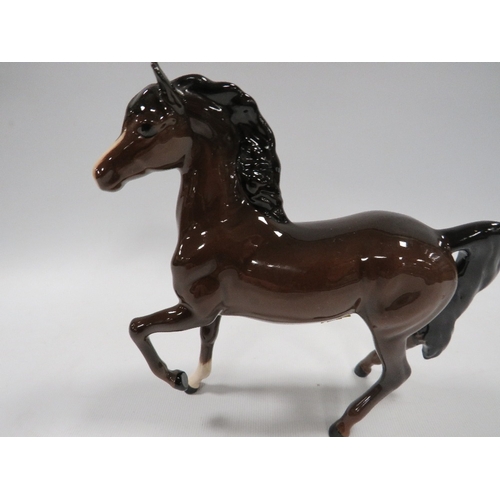 355 - A SMALL ROYAL DOULTON FIGURE OF A HORSE