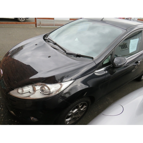 603 - A BLACK 2011 1.4L PETROL FORD FIESTA 'BF61 HVR', LOG BOOK, TWO KEYS, CURRENTLY SORN, MILEAGE AT LAST... 