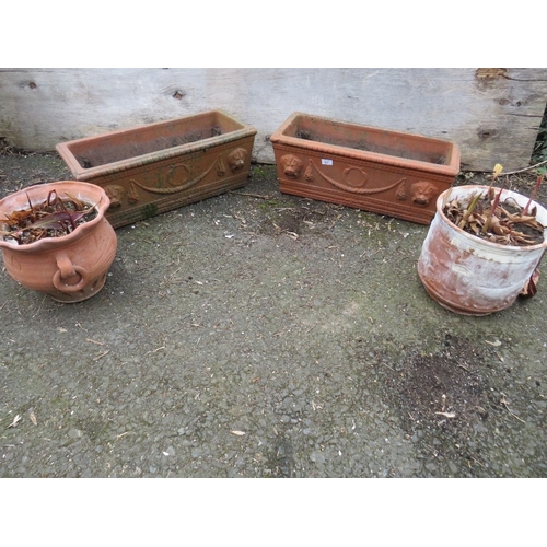 606 - FOUR TERRACOTTA GARDEN PLANTERS