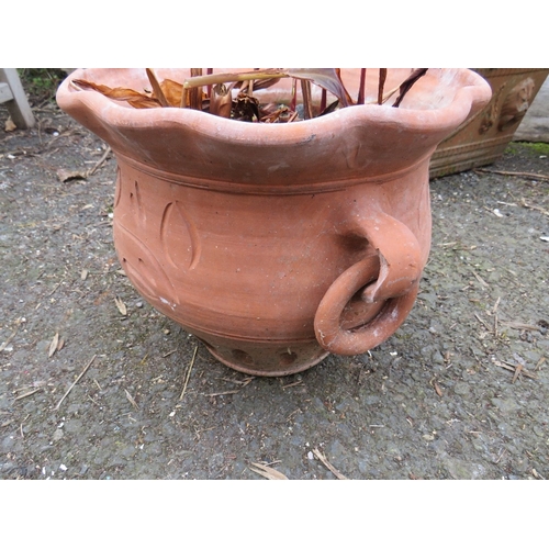 606 - FOUR TERRACOTTA GARDEN PLANTERS