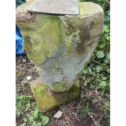 609 - ONE SANDSTONE SUNDIAL, COLUMN DEPICTING A MANS FACE