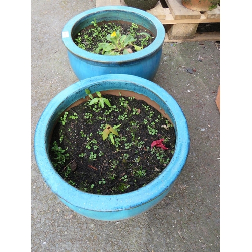 617 - A PAIR OF EXTRA LARGE BLUE CERAMIC GARDEN PLANTERS