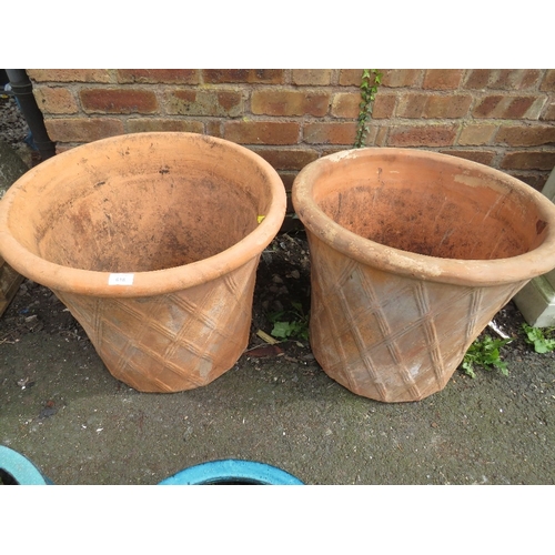 618 - A PAIR OF EXTRA LARGE TERRACOTTA GARDEN PLANTERS