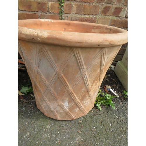 618 - A PAIR OF EXTRA LARGE TERRACOTTA GARDEN PLANTERS