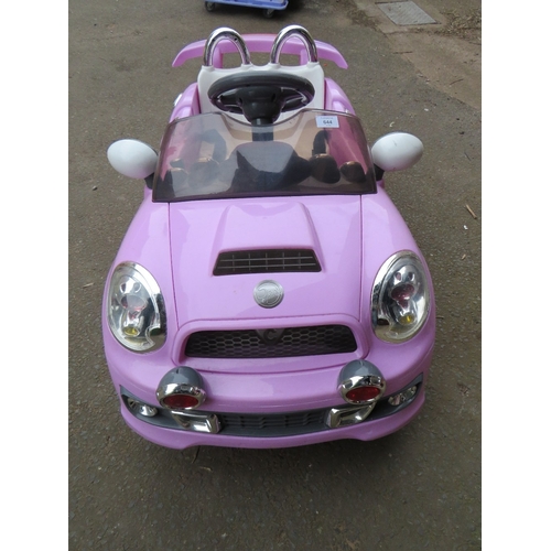 644 - A CHILDS BATTERY RIDE ON CAR LILAC SPORTS MINI - (MISSING CHARGER)