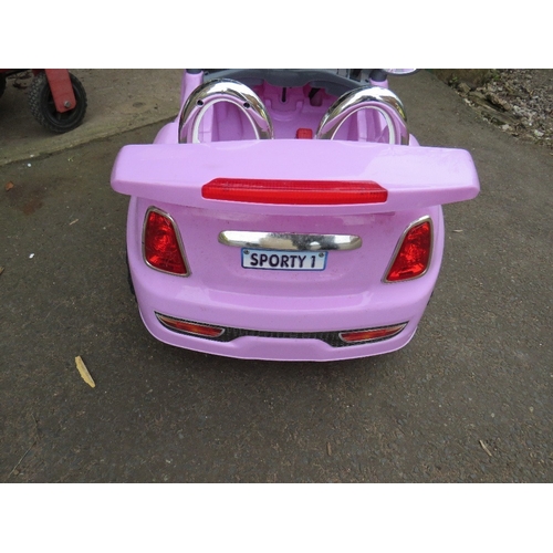 644 - A CHILDS BATTERY RIDE ON CAR LILAC SPORTS MINI - (MISSING CHARGER)