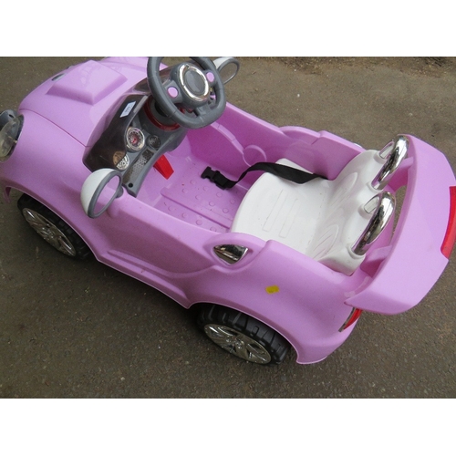 644 - A CHILDS BATTERY RIDE ON CAR LILAC SPORTS MINI - (MISSING CHARGER)