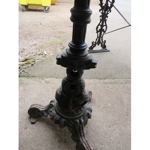 645 - A CAST IRON TABLE AND A PEDESTAL TABLE BASE