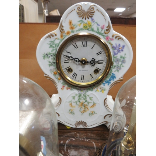 97 - FOUR DECORATIVE MANTLE CLOCKS TO INCLUDE  THREE UNDER GLASS DOMES COMPRISING AN ELVIS PRESLEY COLLEC... 