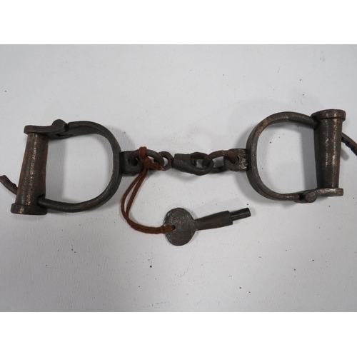 478 - A PAIR OF VICTORIAN HAND CUFFS