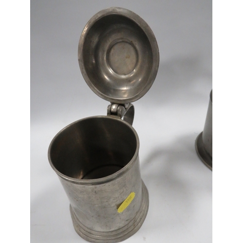 481 - THREE LIDDED PEWTER TANKARDS