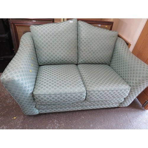 844 - A TWO SEATER SPRUNG EDGE FABRIC SOFA