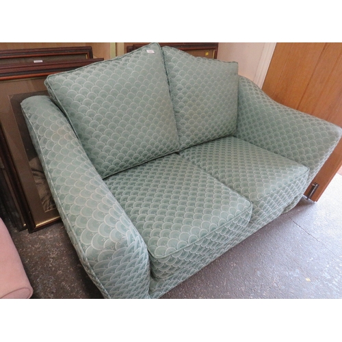 844 - A TWO SEATER SPRUNG EDGE FABRIC SOFA