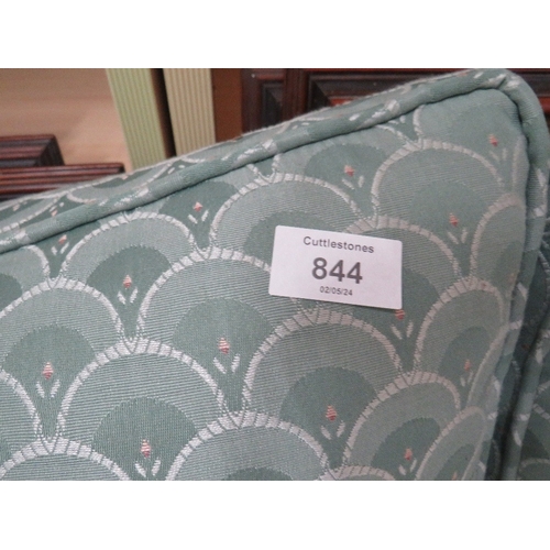 844 - A TWO SEATER SPRUNG EDGE FABRIC SOFA