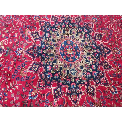 846 - AN ORIENTAL RUG - 330 X 225 CM