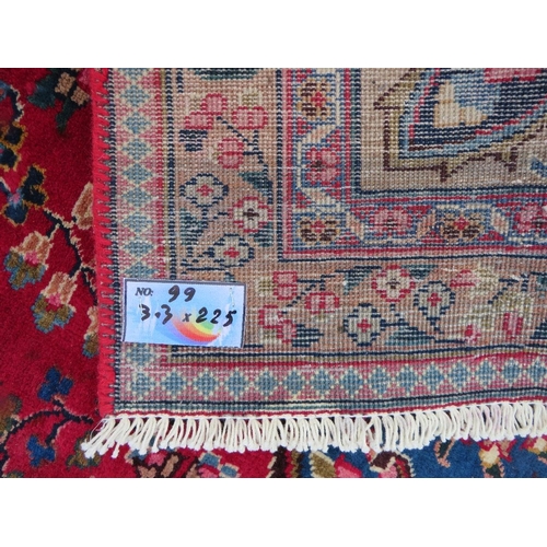 846 - AN ORIENTAL RUG - 330 X 225 CM