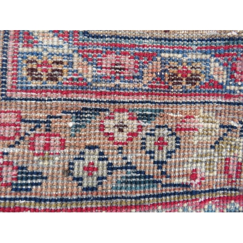 846 - AN ORIENTAL RUG - 330 X 225 CM