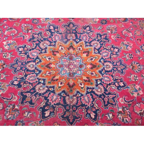 847 - AN ORIENTAL RUG - 315 X 225 CM