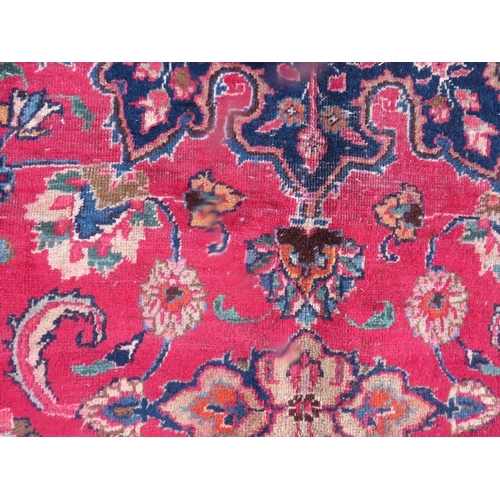 847 - AN ORIENTAL RUG - 315 X 225 CM