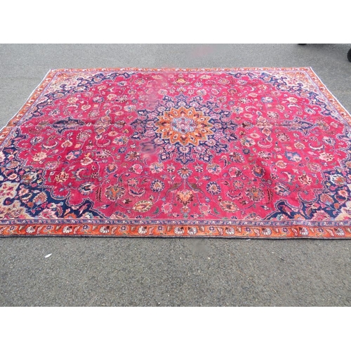 847 - AN ORIENTAL RUG - 315 X 225 CM