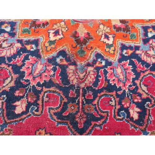 847 - AN ORIENTAL RUG - 315 X 225 CM