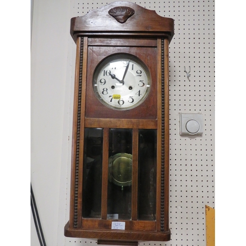 328A - A VINTAGE WALL CLOCK