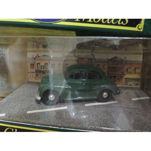 125 - SIXTEEN BOXED CORGI CLASSIC DIE CAST VEHICLES TO INCLUDE MORRIS MINOR, FORD POPULAR, BEDFORD AND DOU... 