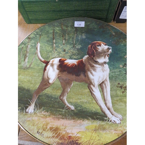 136 - A LARGE CERAMIC CHARGER DECORATED WITH A DOG