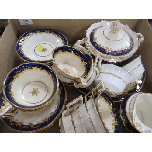 187 - A  TRAY OF BLUE AND GILT TEA WARE