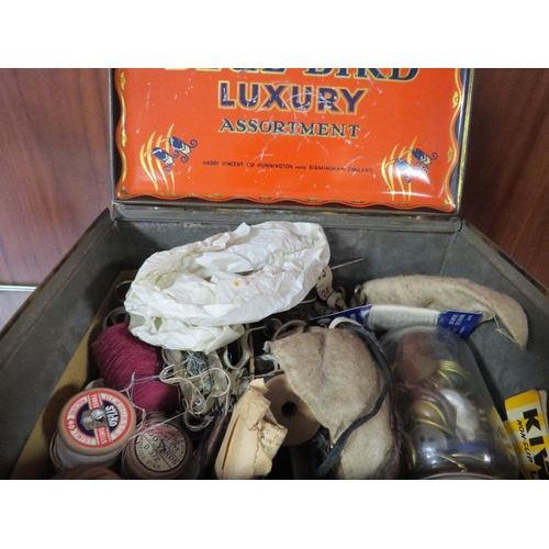 240 - A VINTAGE TIN CONTAINING SEWING ACCESSORIES