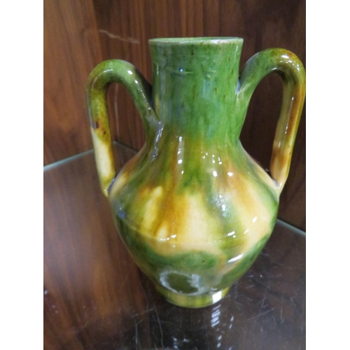 285 - A TWIN HANDLED DRIP GLAZE VASE STAMPED F.P.P. ? VALLAURIS FRANCE