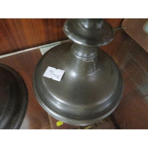 299 - A PAIR OF ANTIQUE PEWTER CANDLESTICKS