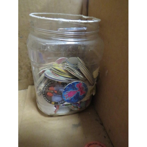 307 - A BOX CONTAINING A LARGE QUANTITY OF POGS AND TAZOS