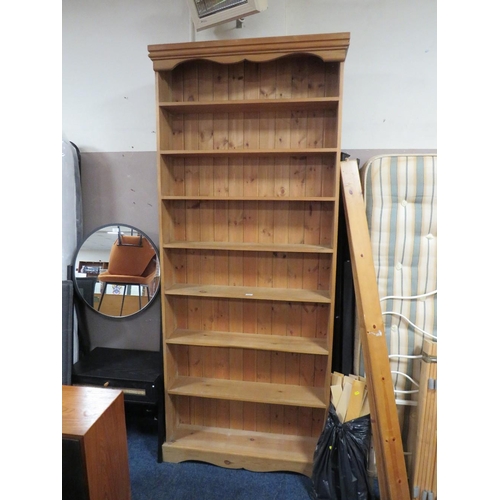 726 - A TALL HONEY PINE OPEN BOOKCASE - 240 X 106 CM