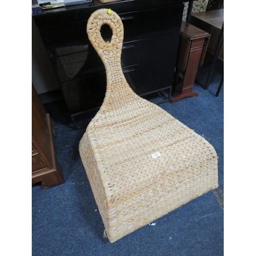 745 - AN UNUSUAL WICKER ROCKING CHAIR