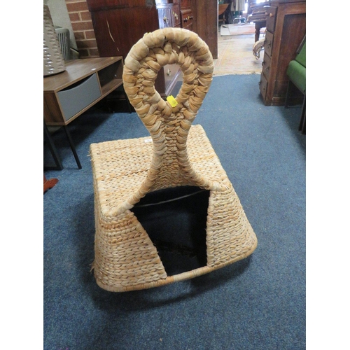 745 - AN UNUSUAL WICKER ROCKING CHAIR