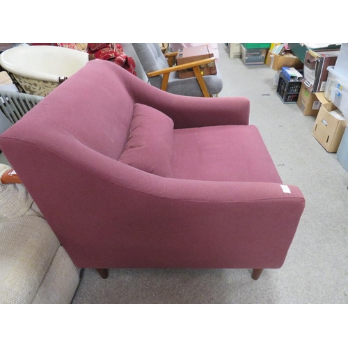 755 - A MODERN MAROON ARMCHAIR